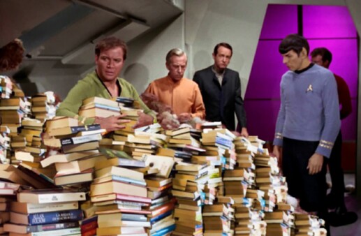 kirk_in_pile_of_books2