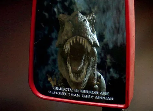 trex-chasing-car
